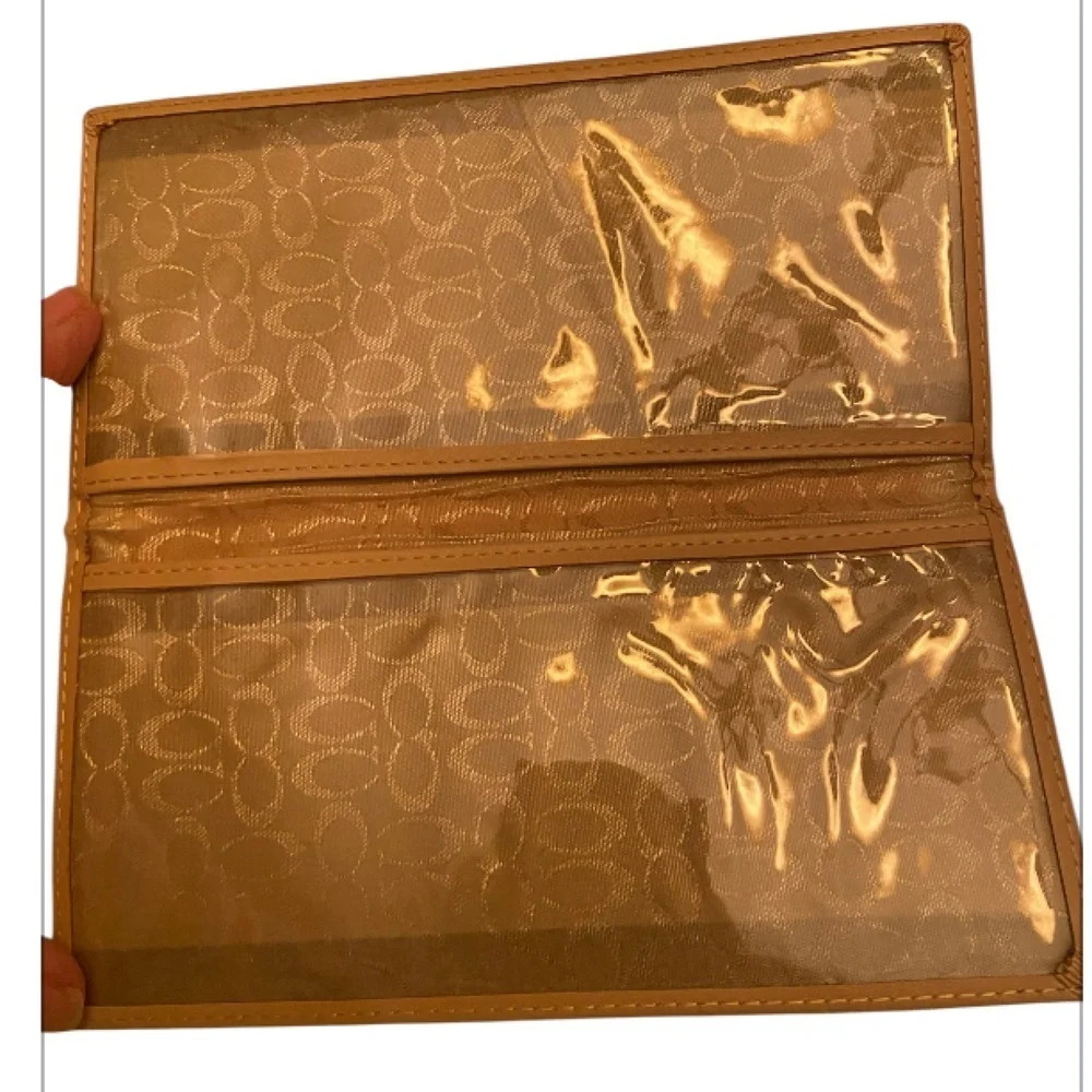 Coach Signature canvas and leather continental wallet